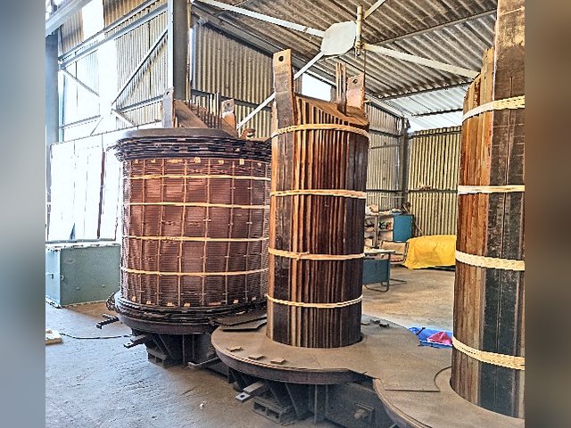Transformer windings during rewinding in the Om Electricals Power workshop