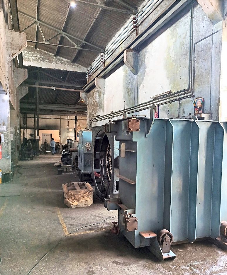 Power transformer under repair in the Om Electricals Power workshop